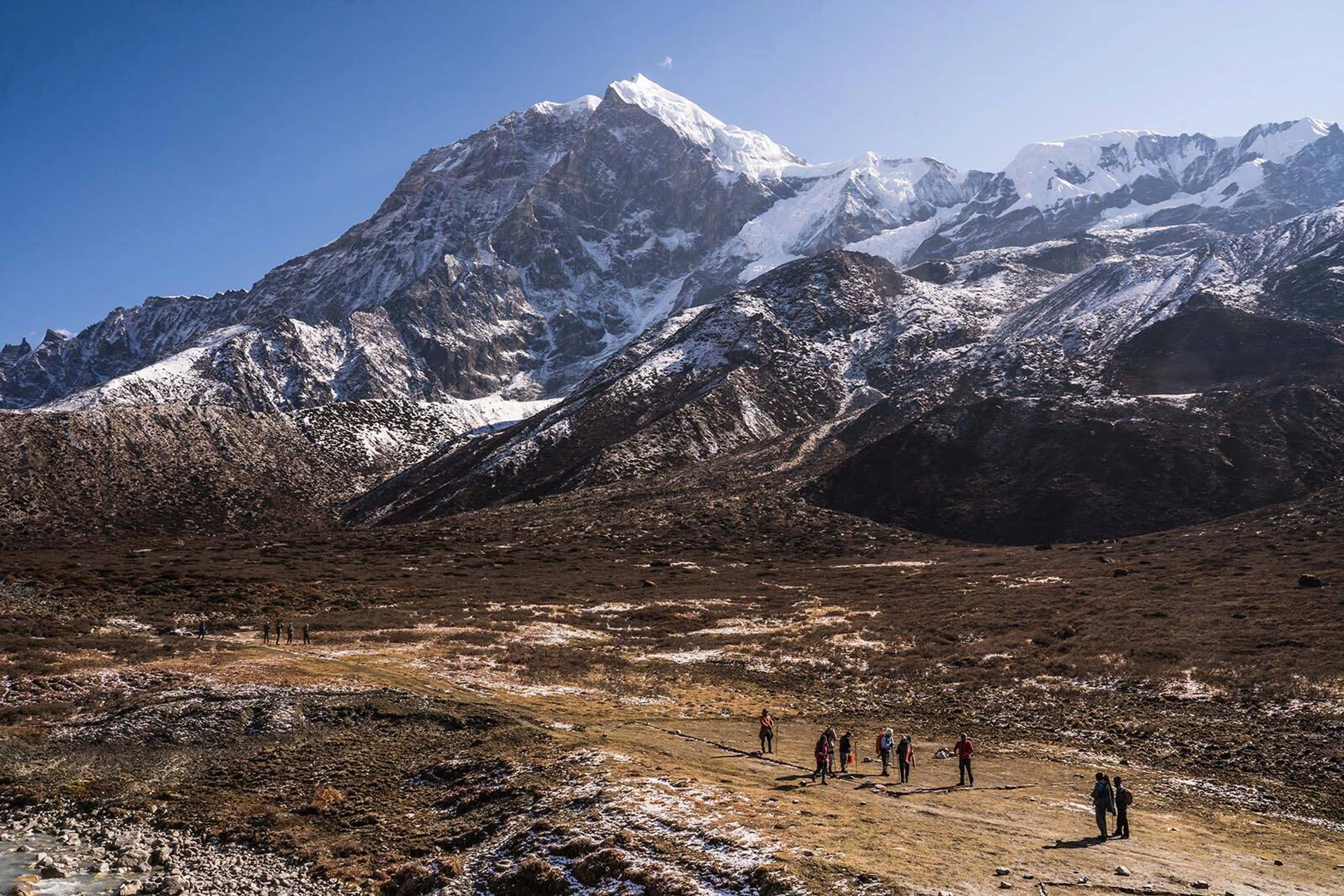 e093a4fd ba3f 4b1f 87c4 bfc27f77faca Goechala+–+G+Hassan+Kumar+–+Pandim+watches+over+trekkers+enroute+Thansing+Campsite.jpg?&q=50&org if